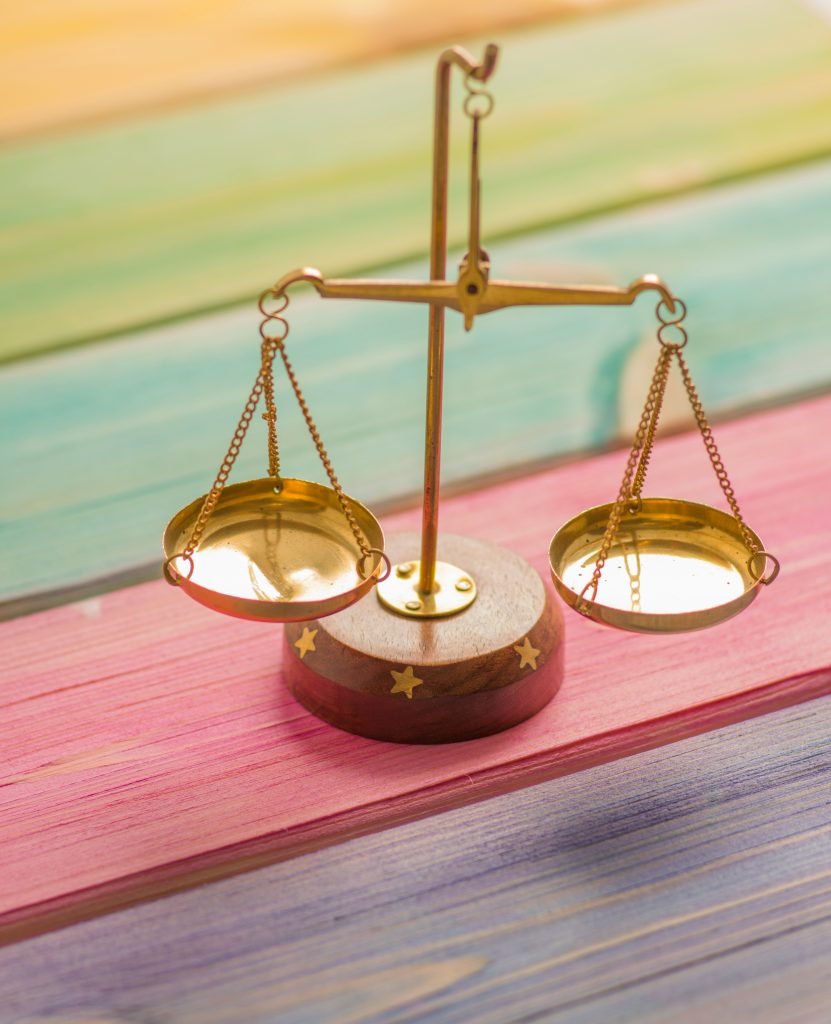 Weighing scales on colourful background